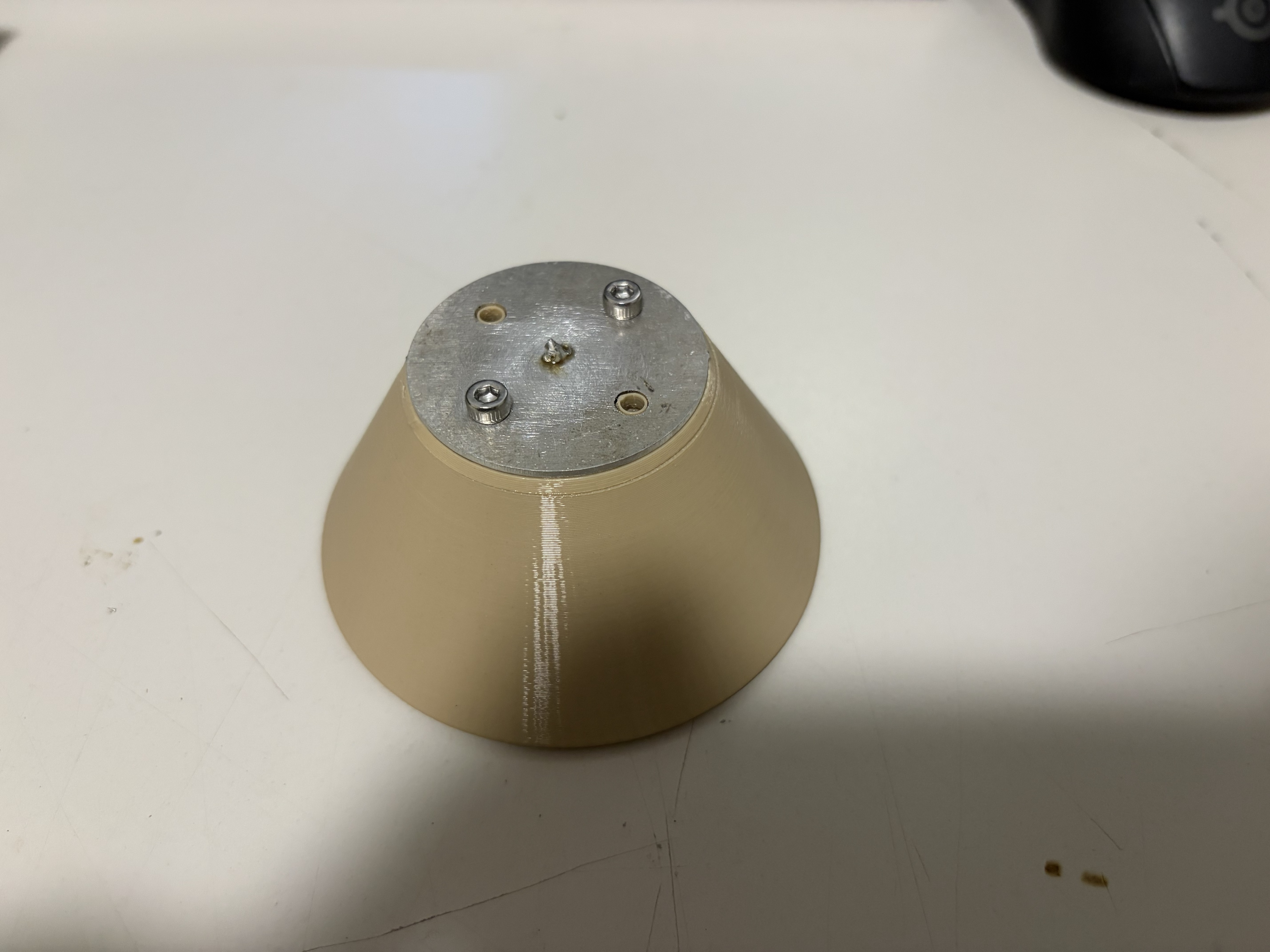 Top sheet metal plate with center contact